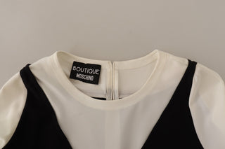 Blusa de poliéster blanca y negra de manga corta