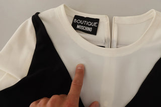 Blusa de poliéster blanca y negra de manga corta