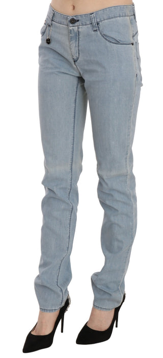 Jeans ajustados de mezclilla azul claro de talle medio