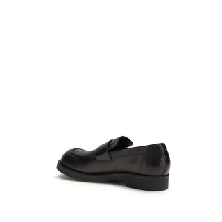 Mocasines slip-on de piel de becerro negra Bos Taurus