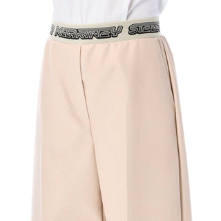 Pantalones casuales beige de viscosa