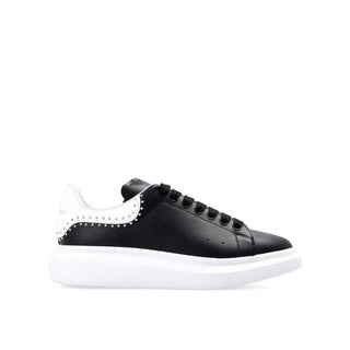 Zapatillas negras gruesas de piel de becerro