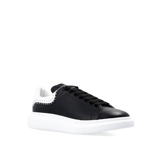 Zapatillas negras gruesas de piel de becerro