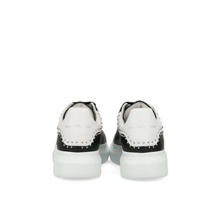 Zapatillas negras gruesas de piel de becerro