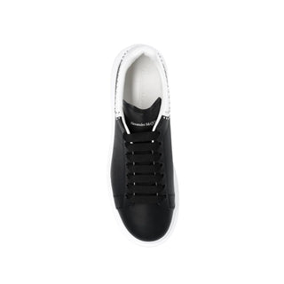 Zapatillas negras gruesas de piel de becerro