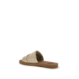 Flache Sandalen aus goldfarbenem Polyester