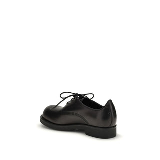 Schwarze Oxfords und Derbys aus Kalbsleder (Bos Taurus)