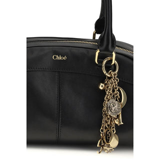 Handtasche aus schwarzem Kalbsleder (Bos Taurus)