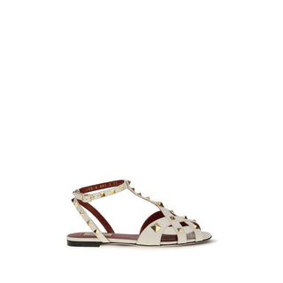 Sandalias planas de piel de cabra beige  