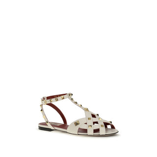Sandalias planas de piel de cabra beige  