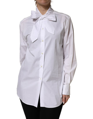 Blusa blanca de algodón con lazo y mangas largas