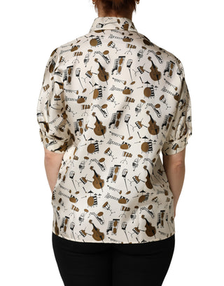 Top beige de manga corta con estampado de instrumentos musicales