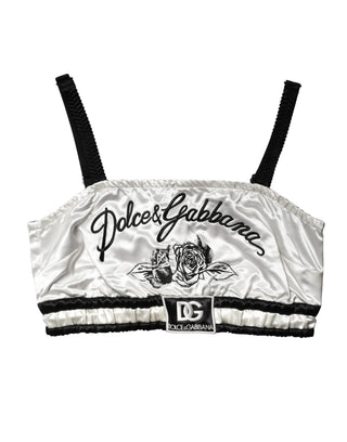 Top corto blanco de satén de seda con logo negro y bralette
