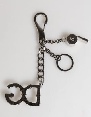 Schlüsselanhänger aus Silber, Messing, Metall mit DG-Logo und Kristall