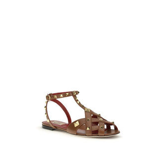 Sandalias con tiras de piel de cabra marrón