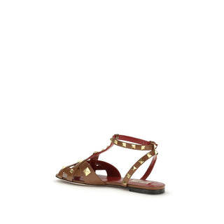 Sandalias con tiras de piel de cabra marrón