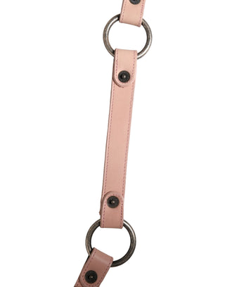 Cinturón ancho rosa claro de cuero con hebilla redonda