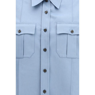 Camisa azul de algodón de manga corta