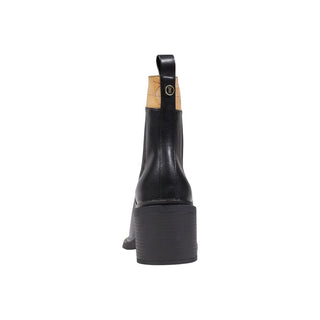 Botines negros de polietileno