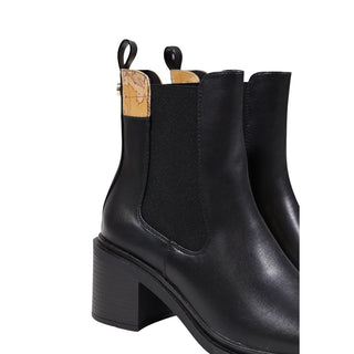 Botines negros de polietileno