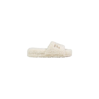 Zapatillas de tela crema