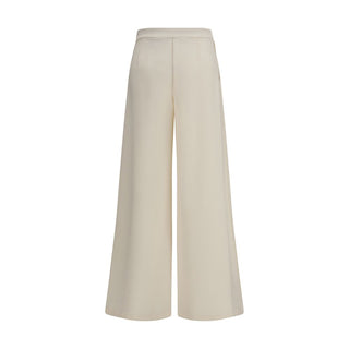 Pantalones acampanados de poliamida beige