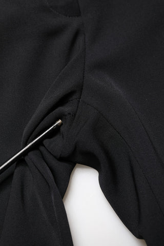 Schwarze High-Waist-Hose aus Wolle, verkürzt, konisch zulaufend