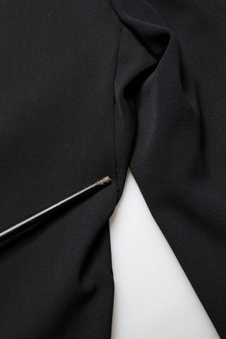Schwarze High-Waist-Hose aus Wolle, verkürzt, konisch zulaufend