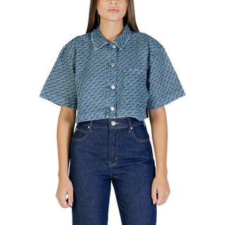 Camisa azul de algodón de manga corta
