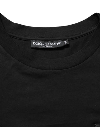 Schwarzes Baumwoll-T-Shirt mit Logo-Plakette und Rundhalsausschnitt