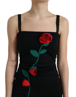 Vestido sin mangas de lana negra con aplique de rosa  