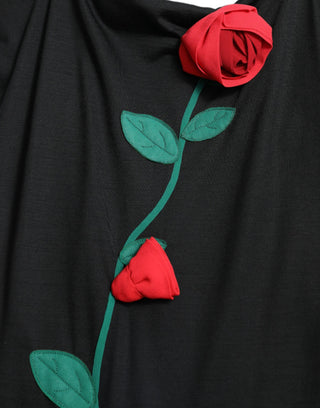 Vestido sin mangas de lana negra con aplique de rosa  