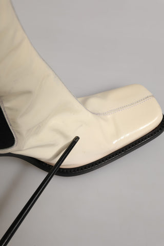 Weiße schwarze kniehohe Stiefel aus Leder