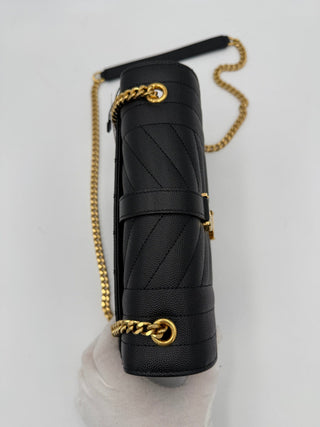 Bolso SAINT LAURENT ENVELOPE SMALL en cuero granulado negro