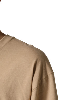Camiseta beige de algodón con cuello redondo y corte oversize