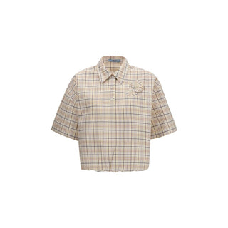 Camisa beige con estampado de tela