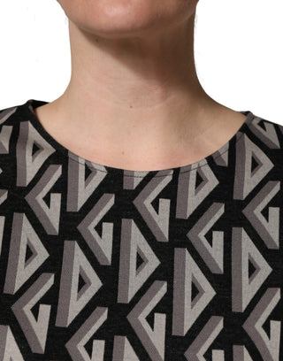 Vestido de algodón negro con estampado de logo hasta la rodilla