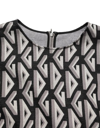 Vestido de algodón negro con estampado de logo hasta la rodilla