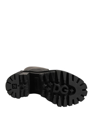 Botas altas negras de cuero con recubrimiento de goma