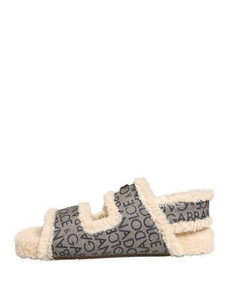 Sandalias planas con estampado de logo y piel sintética beige