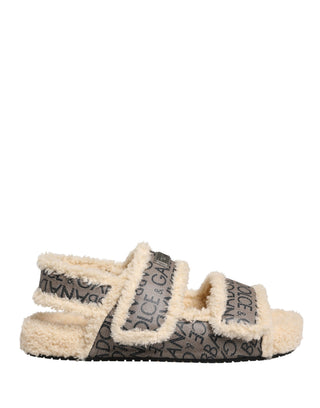 Sandalias planas con estampado de logo y piel sintética beige
