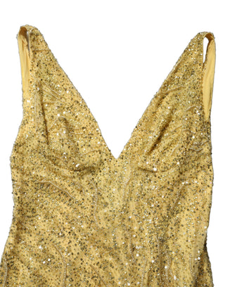 Vestido sirena dorado con escote en V y lentejuelas