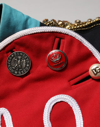 Chaqueta corta asimétrica multicolor con joyas ornamentales  