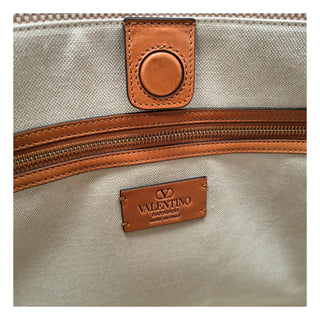 Bolso de mano beige de tela