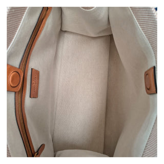 Bolso de mano beige de tela