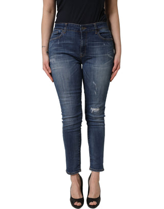 Jeans ajustados azules de cintura media con desgastes  