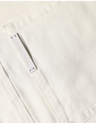 Jeans ajustados blancos de algodón con desgastes  