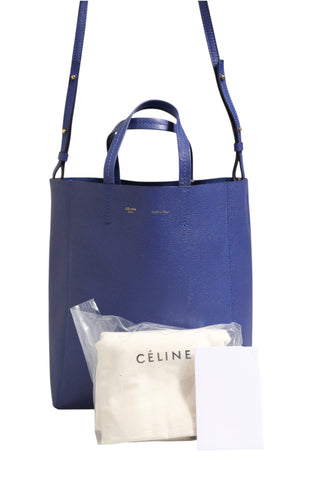 Bolso tote azul con detalles dorados