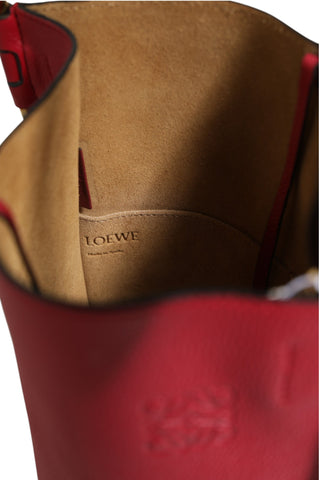 Bolso tipo cubo Gate de cuero frambuesa y vino