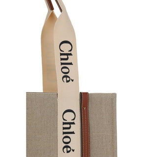 Bolso de mano beige de lino